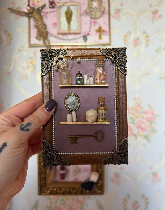 Rahmen mit Miniaturen